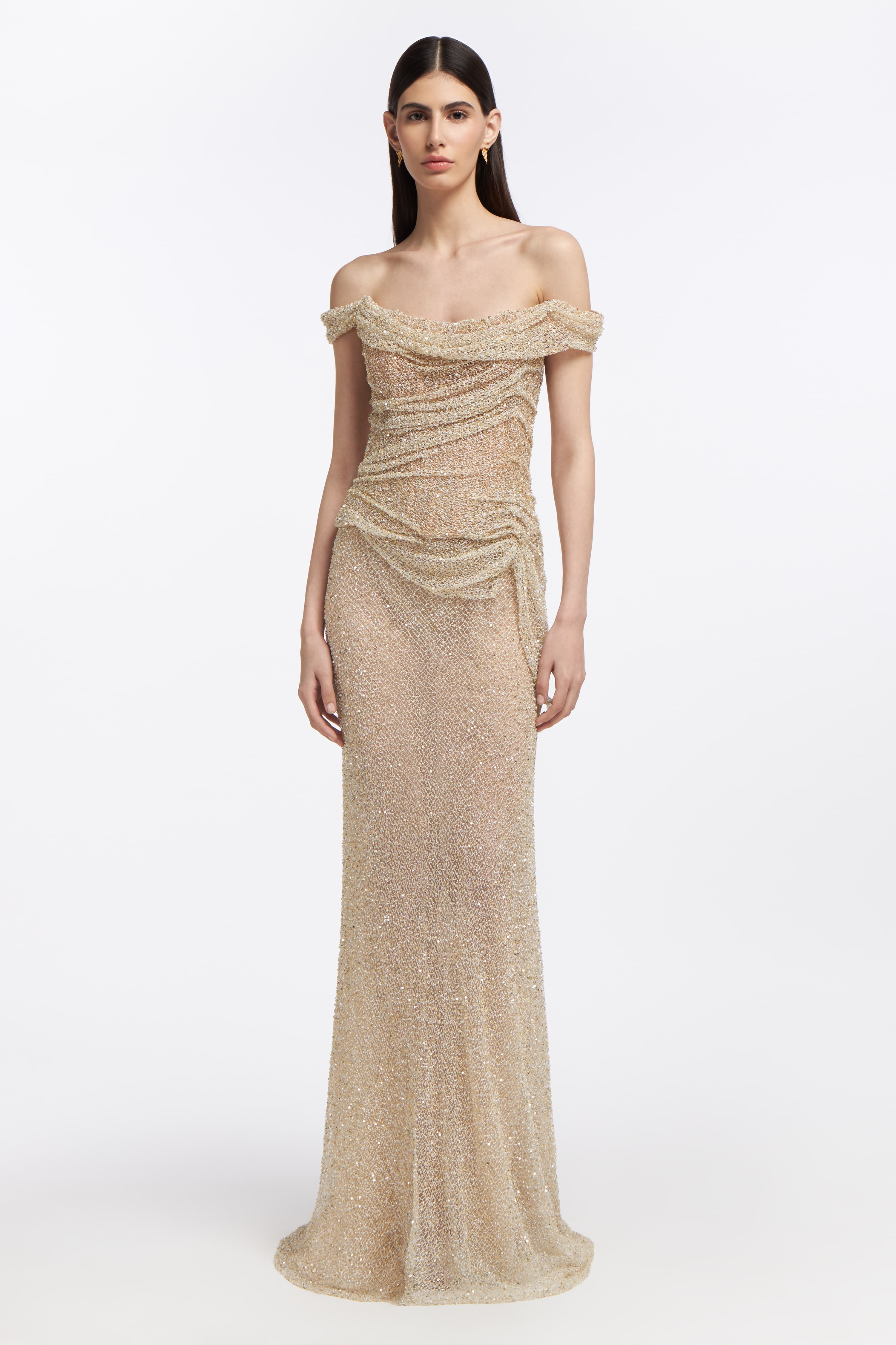 Calypso Beaded Gown featuring an off-the-shoulder neckline, intricate beadwork, and a draped silhouette. A stunning bridal dress for Spring 2025.