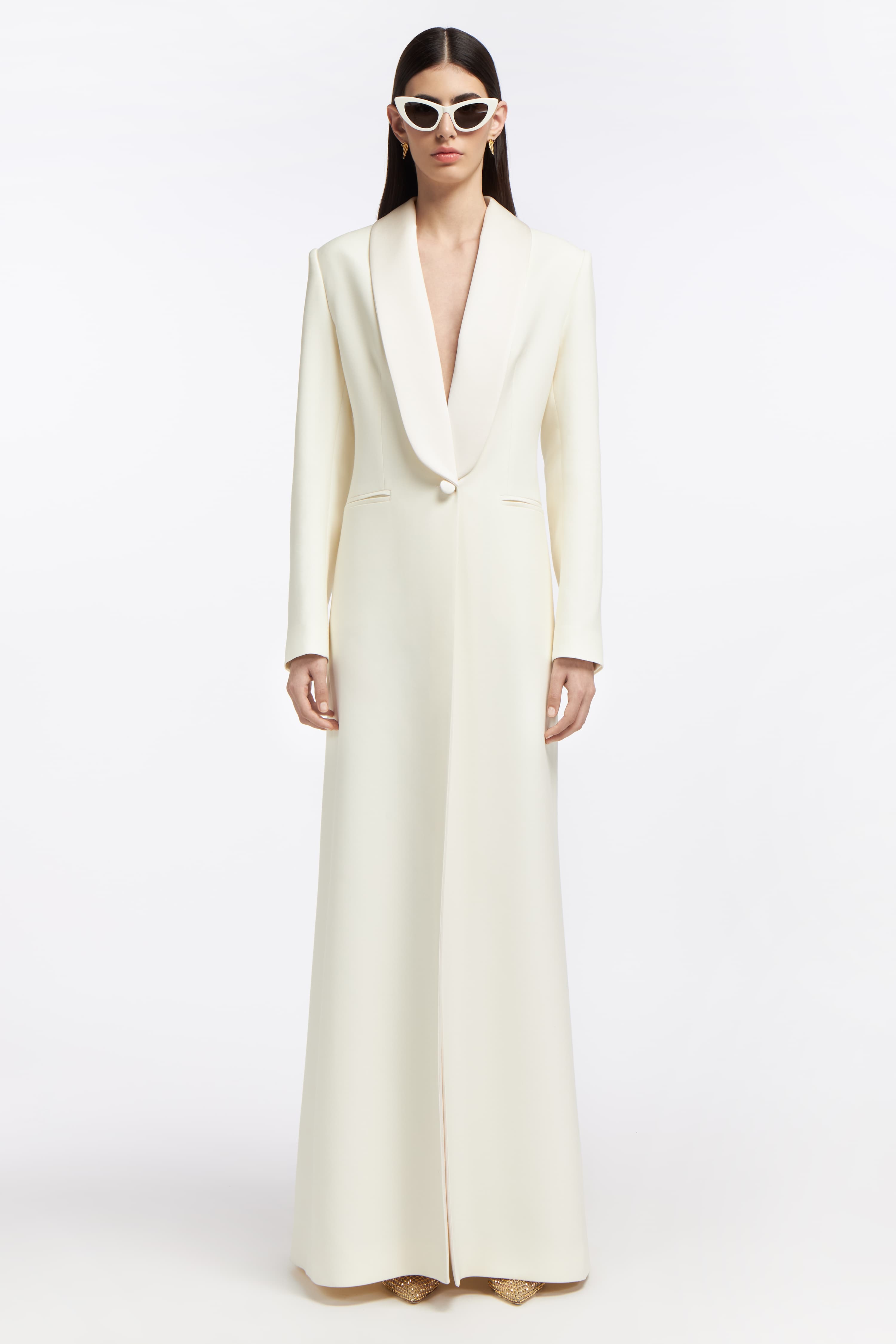 Gaia Silk-blend Wool Coat in ivory, a sophisticated bridal wedding dress with a tailored fit, deep lapel, and floor-length silhouette for Spring 2025.