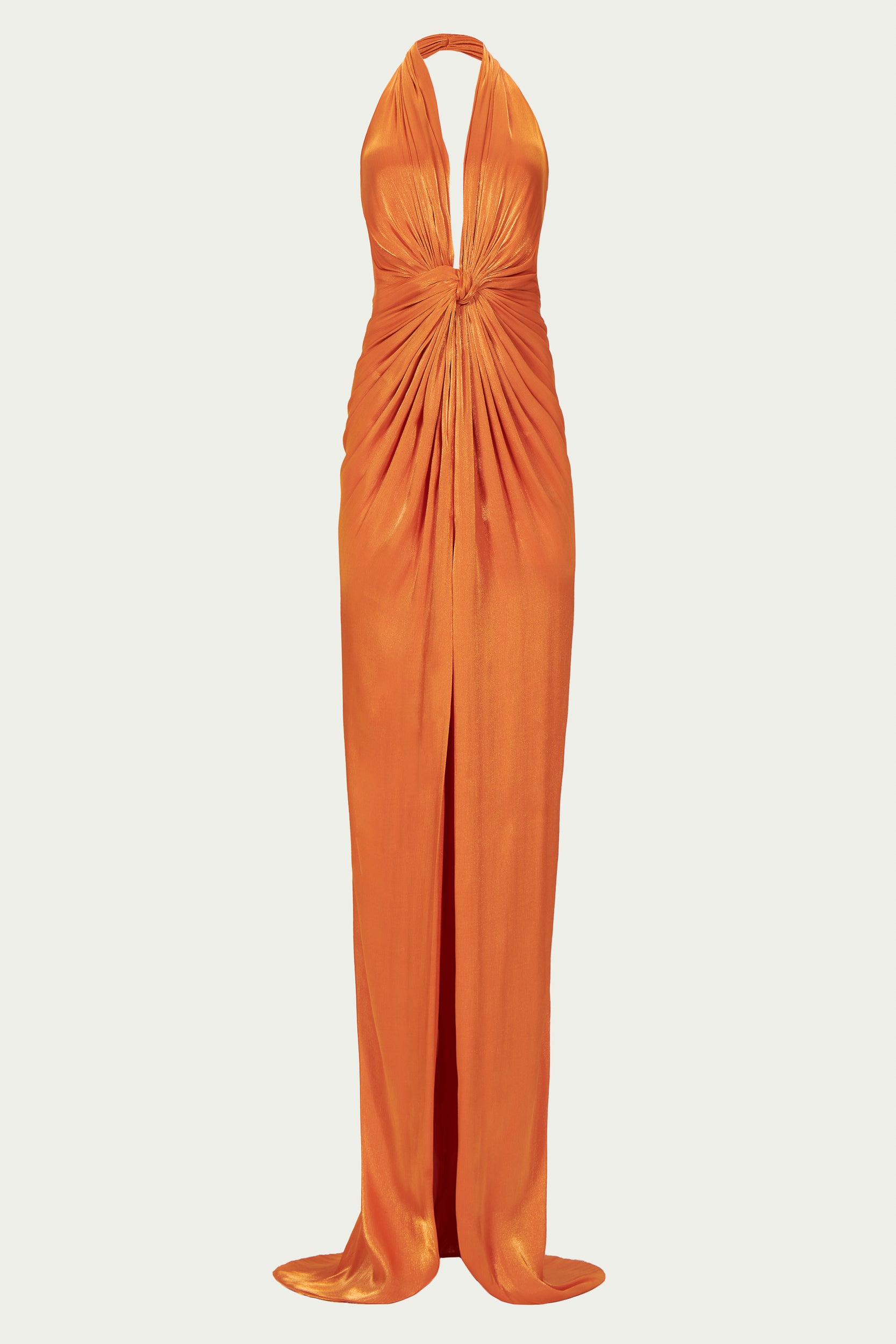 Signature Costarellos halterneck gown with twisted draped front and thigh high central slit in shimmering apricot orange