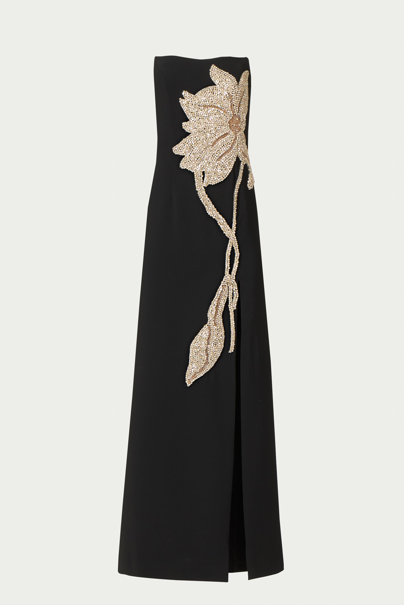 Strapless full length black Costarellos evening gown with thigh high slit and oversized beaded floral applique across the bustier.