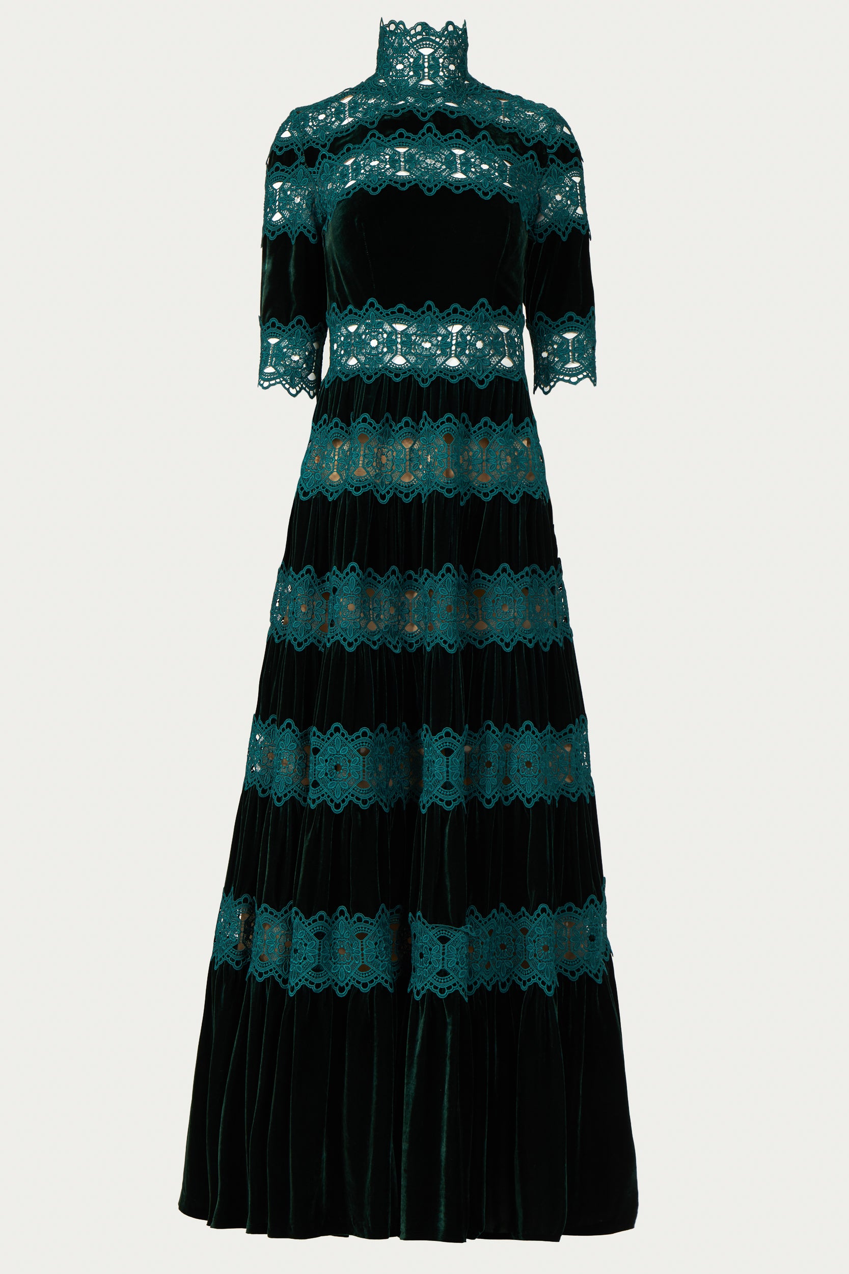 Lace and velvet tiered Costarellos evening dress with elbow length sleeves and high neck in bright green.