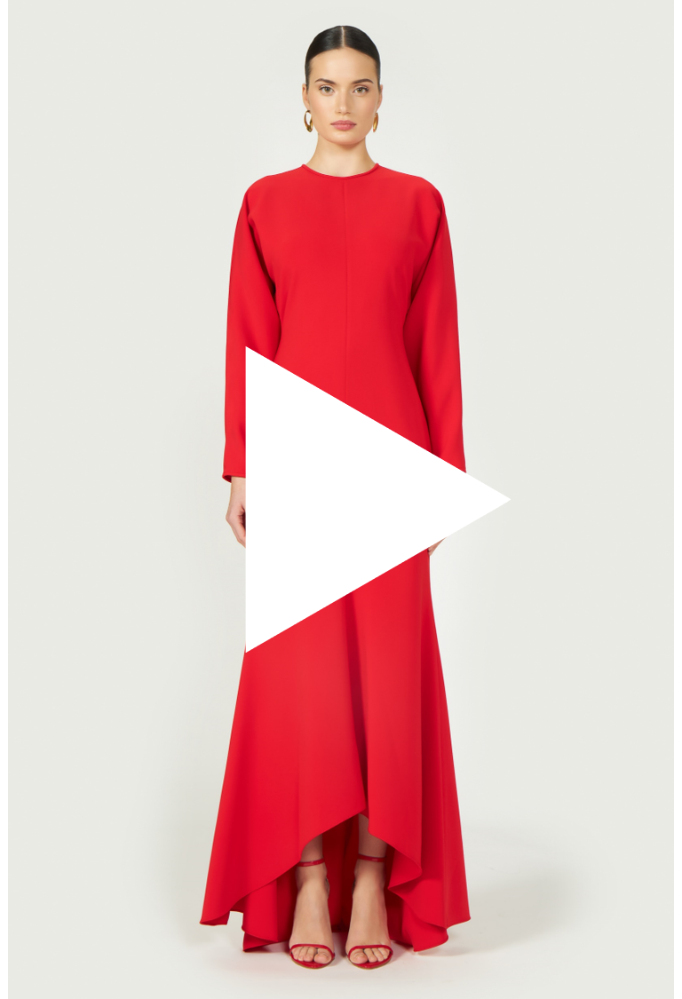 Video thumbnail of the Marlette High-Low Crepe Gown, showcasing its elegant drape, long sleeves, and bold red hue for a statement look.