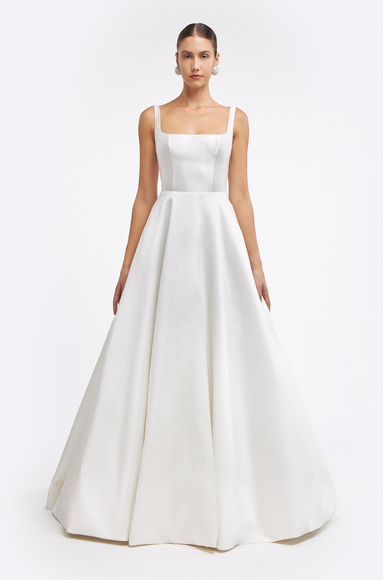 Elegant Damara Mikado Gown featuring a square neckline and A-line silhouette, perfect for bridal wear. Crafted from luxurious mikado fabric for a timeless look.