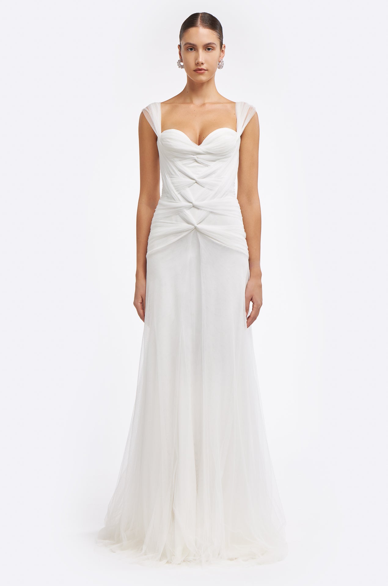 Neda Knotted French Tulle Gown featuring a sweetheart neckline, delicate knotted detailing, and a flowing silhouette. Perfect for Bridal Spring 2025.