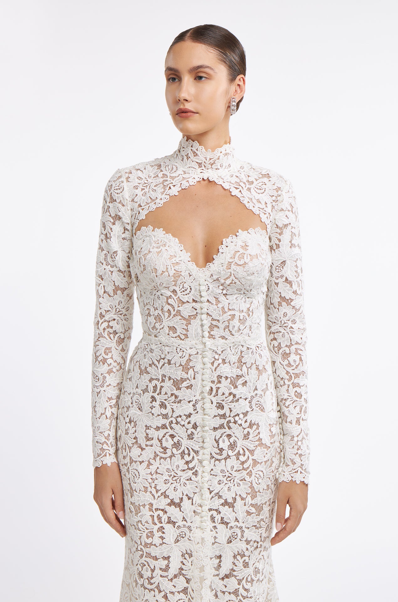 Valeria Corded Lace Strapless Gown styled with a detachable high-neck lace bolero, adding elegance and versatility to the bridal look.